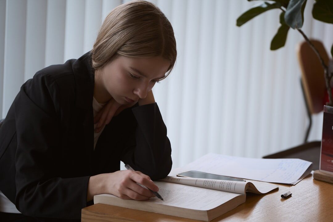 mystery writer at desk with notebook